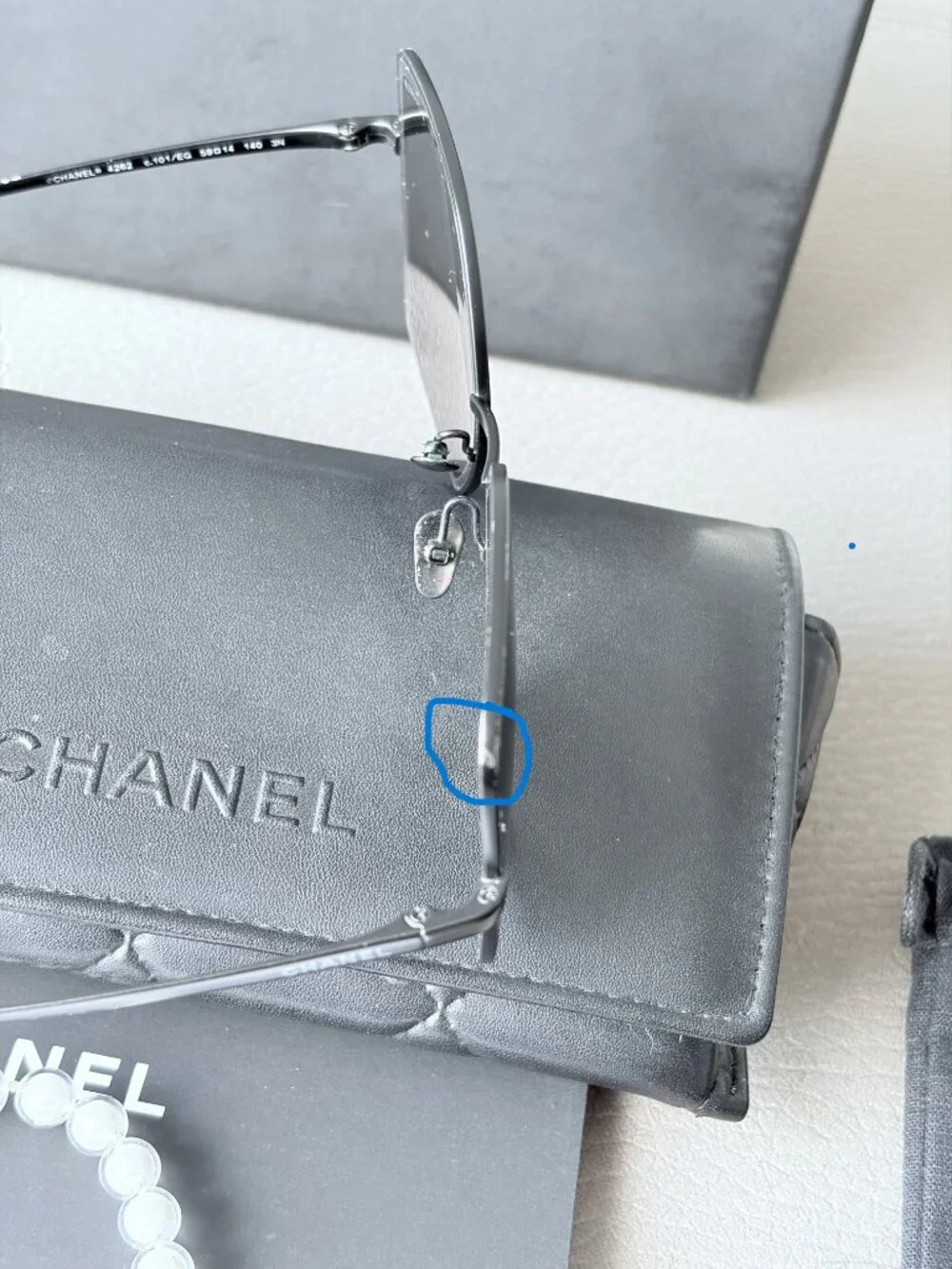 Chanel Butterfly Sunglasses featuring a removable pearl chain